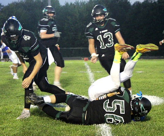 North Callaway senior inside linebacker Tanner Pezold slams a Wright City ballcarrier to the ground during the No. 9 Thunderbirds' 43-7 EMO blitz of the Wildcats on Friday night, Sept. 22, 2017 in Kingdom City.