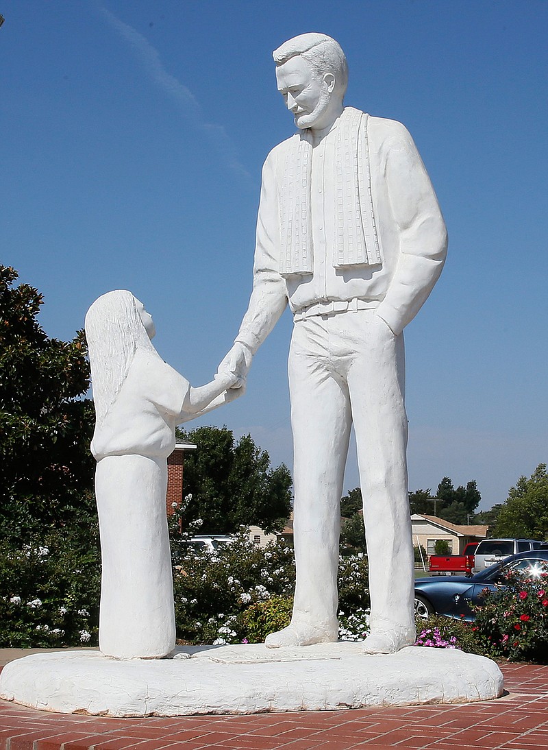 A statue in tribute to Father Stanley Rother stands on the grounds of Holy Trinity Catholic Church in Okarche, Okla, Thursday, Sept. 21, 2017. Rother was an American priest killed during Guatemala's civil war, who is on the path to possible sainthood. A ceremony for Rother's Beatification is scheduled for Saturday, Sept. 23, 2017. 