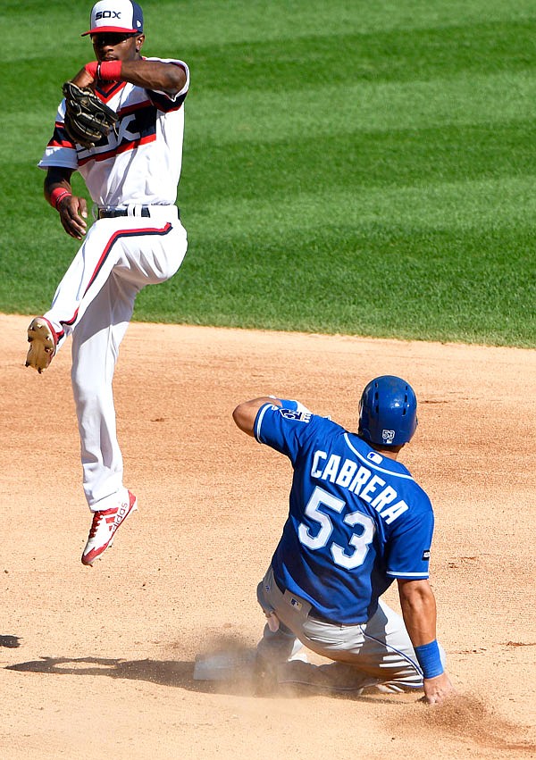 White Sox shortstop Tim Anderson catches a throw as the Royals' Melky Cabrera slides safely into second base during the sixth inning of Sunday afternoon's game in Chicago.