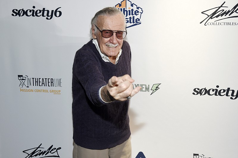FILE - In this Aug. 22, 2017, file photo, comic book writer Stan Lee strikes a "Spider-Man" pose at the "Extraordinary: Stan Lee" tribute event at the Saban Theatre in Beverly Hills, Calif. (Photo by Chris Pizzello/Invision/AP, File)