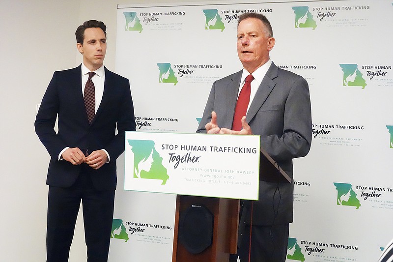 Dan Mehan, president and CEO of Missouri Chamber of Commerce, speaks Tuesday at the launch of the Business Council Against Human Trafficking. Attorney General Josh Hawley is seen at left.