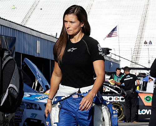 Danica Patrick walks in the garage area prior to a practice session last week at New Hampshire Motor Speedway in Loudon, N.H.