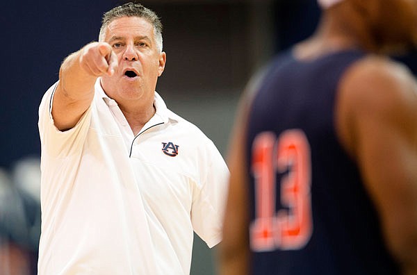 Auburn head coach Bruce Pearl directs his players during practice, Friday in Auburn, Ala.