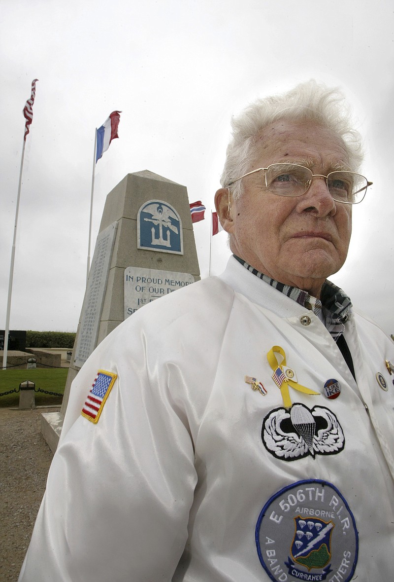 FILE - In this June 6, 2005, file photo, Don Malarkey, American veteran from the 101st airborne "Easy" Company," attends ceremonies to commemorate the Allied D-Day landings of World War II, on Utah Beach, northwestern France. Donald Malarkey, a World War II paratrooper who was awarded the Bronze Star after parachuting behind enemy lines at Normandy to destroy German artillery on D-Day, has died at the age of 96. Malarkey was one of several members of "Easy Company" to be widely portrayed in the HBO miniseries, "Band of Brothers." He died Sept. 30, 2017, in Salem, Oregon of age-related causes, his son-in-law John Hill said Sunday, Oct. 1. (AP Photo/Franck Prevel, File)
