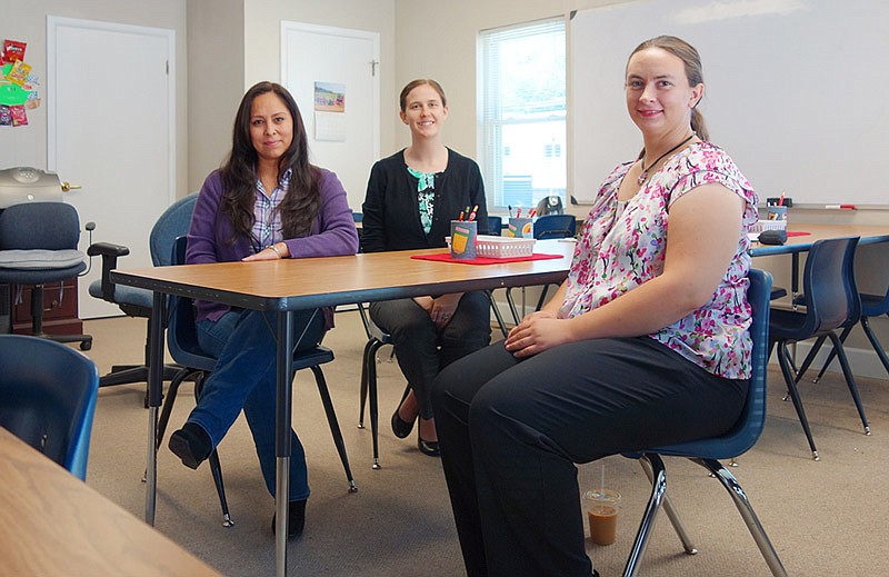 Stephany Schler, center, is the coordinator of the Jefferson City Public Schools' Adult Education and Literacy program. Ana Elia Perez, left, and Jessie Lee recently completed the program.