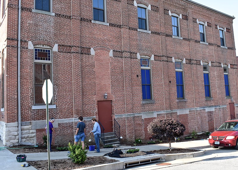 <p>The north side of the historic Finke Theatre, as it appears following the restoration on the windows and the landscaping done to improve the appearance of the landmark. (Photo submitted)</p>