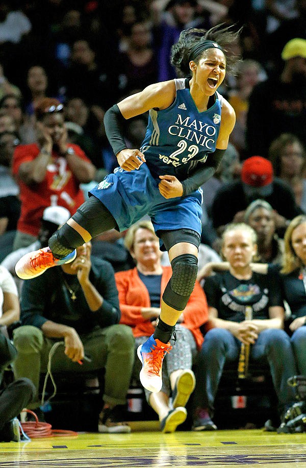 Lynx forward Maya Moore reacts after she made a shot and got a foul called on the Sparks during the second half in Game 4 of the WNBA Finals on Sunday in Los Angeles.