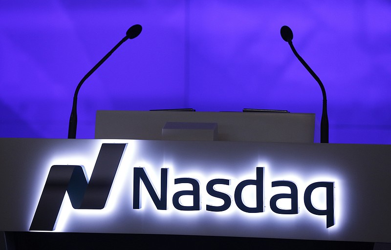 This Monday, Nov. 30, 2015, photo, shows the Nasdaq logo displayed in the electronic stock trading company's Times Square location in New York. U.S. stock indexes peeked higher in morning trading on Thursday, Oct. 5, 2017, and if the Standard & Poor’s 500 maintains its slight gain, it would mark the longest winning streak for the index in four years. Trading was again mostly quiet around the world, and markets were closed at several of Asia’s big exchanges due to holidays. (AP Photo/Mark Lennihan)