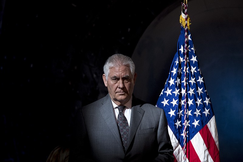 Secretary of State Rex Tillerson arrives for the first meeting of the National Space Council first meeting at the Steven F. Udvar-Hazy Center, Thursday, Oct. 5, 2017 in Chantilly, Va. Tillerson has declared he never considered resigning as President Donald Trump's top diplomat, disputing what he called an "erroneous" report that he wanted to step down earlier this year.(AP Photo/Andrew Harnik)