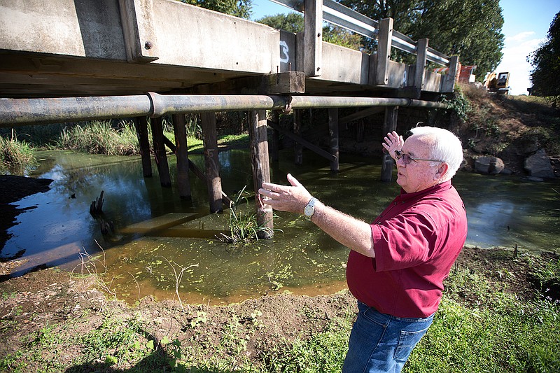 Roy John McNatt, Miller County judge, talks Thursday about needed repairs to the McKinney Bayou bridge. The county recently closed the bridge, eliminating access from the south to Interstate 49 from Sanderson Lane, after it was discovered to be unsafe for travel. The bridge sits on the city limits line. So both the county and the city of Texarkana, Ark., will pay for the repairs. 

