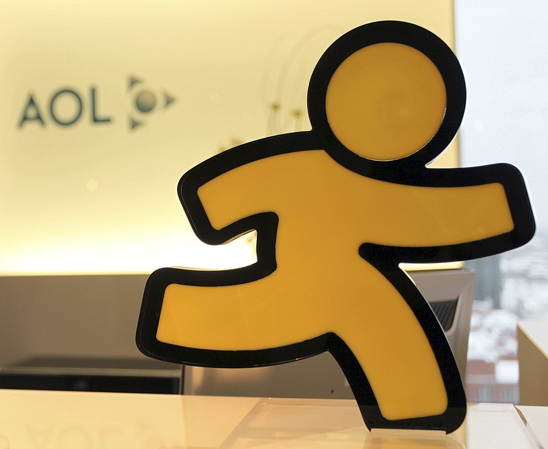 FILE - In this Jan. 12, 2010, file photo, an AOL logo is seen in the company's office in Hamburg, Germany. AOL announced on Oct. 6, 2017, that it will discontinue its once-popular Instant Messenger platform on Dec. 15(AP Photo/Axel Heimken, File)