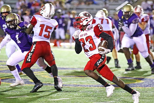 Jefferson City receiver Christian White finds space to run after making a catch during last Friday night's game against C.B.C. in St. Louis.