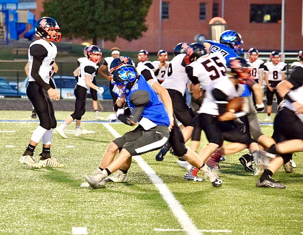 South Callaway senior defensive back Jared Stieferman makes a tackle in the backfield during the Bulldogs' 47-12 win against Bowling Green last Friday in Mokane.