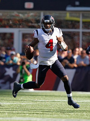 Texans quarterback Deshaun Watson looks for a receiver during a game against the Patriots last month in  Foxborough, Mass.