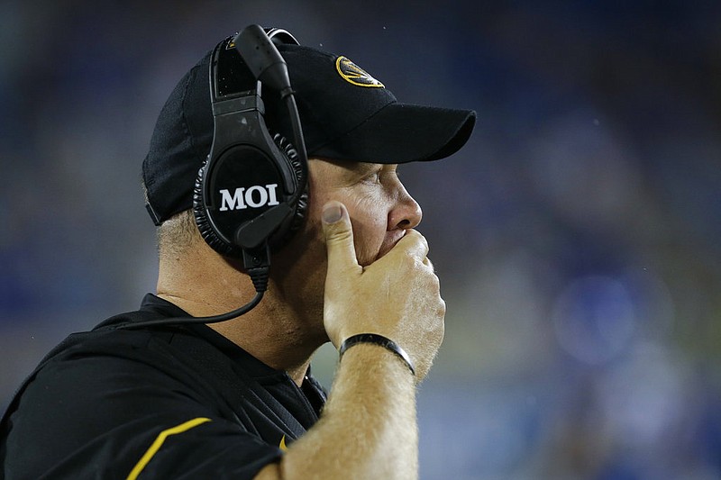 Missouri head coach Barry Odom watches his team line up for a play during the second half of an NCAA college football game against Kentucky, Saturday, Oct. 7, 2017, in Lexington, Ky. Kentucky won the game 40-34.