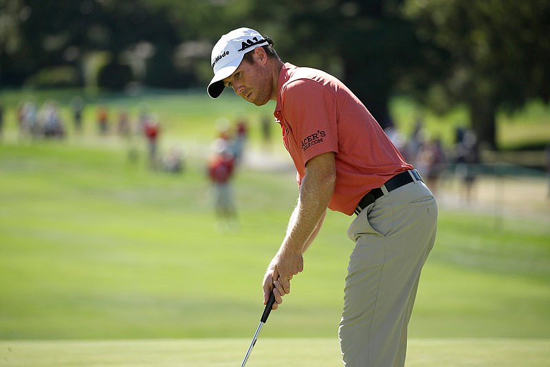 Tyler Duncan putts for a birdie on the first green of the Silverado Resort North Course during the third round of the Safeway Open PGA golf tournament Saturday, Oct. 7, 2017, in Napa, Calif. (AP Photo/Eric Risberg)