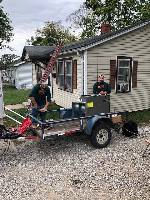 2017 FILE: Workers from Garrett and Campbell, of Fulton, installed two new Lennox furnaces for two lucky homeowners as part of the Heat UP Missouri! initiative.
