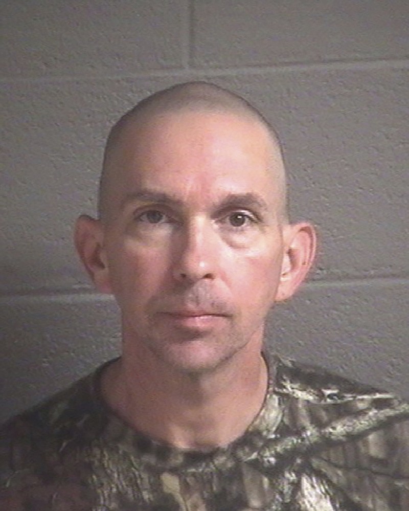 This undated photo provided by the Buncombe County Detention Center shows Michael Christopher Estes, who’s accused of planting an improvised explosive device at the airport on Friday, Oct. 6, 2017, in Asheville, N.C. A criminal complaint in federal court accuses Estes of attempted malicious use of explosive materials and unlawful possession of explosives at the airport. (Buncombe County Detention Center via AP)
