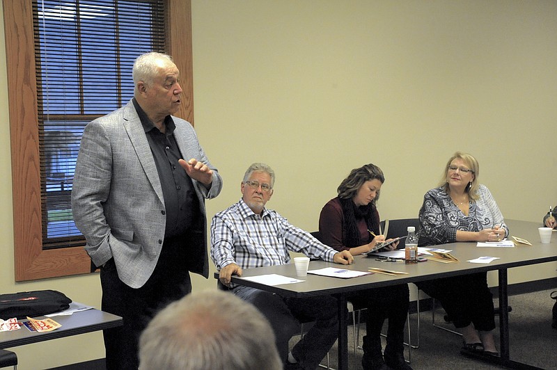 Dan Mesey, the Moniteau County coordinator for the U.S. Marine Corps Reserve Toys for Tots, explains the new program to the California Area Chamber of Commerce on Oct. 12.