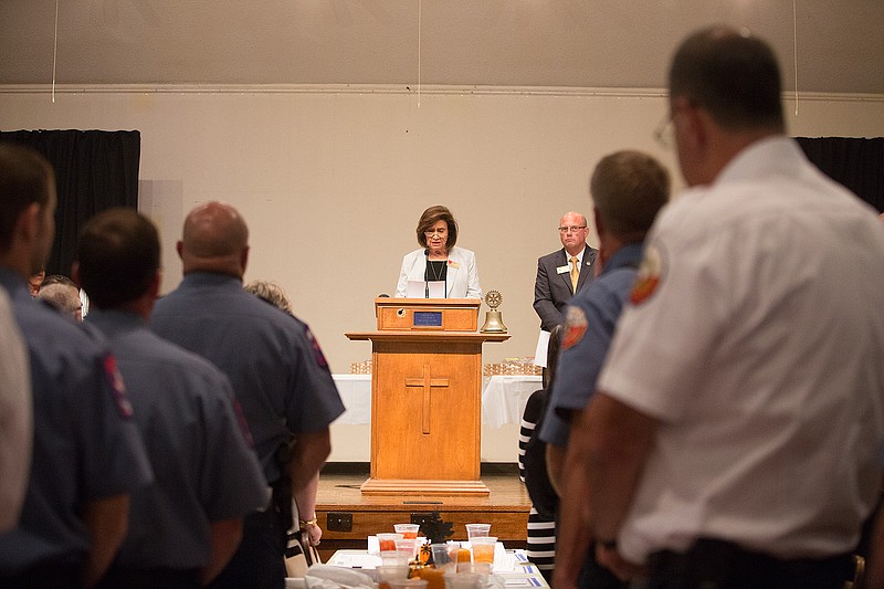 Texarkana, Ark., Mayor Ruth Penney Bell reads an end of watch memorial Thursday for Miller County Sheriff's Office Detention Supervisor Lisa Mauldin. Mauldin died in the line of duty on Dec. 18, 2016. Texarkana Rotary Clubs hosted their 37th annual Public Safety Officers Appreciation Luncheon at the Cafe Center.