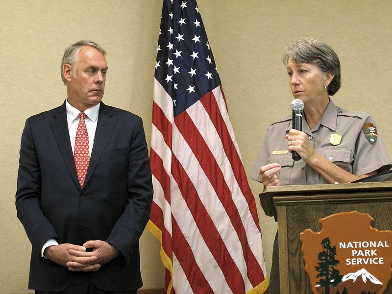 Interior Secretary Ryan Zinke, left, and Grand Canyon National Park Superintendent Chris Lehnertz address National Park Service employees Friday, Oct. 13, 2017, at Grand Canyon National Park, Ariz. A survey of Park Service employees found nearly two in five have experienced some sort of harassment or discrimination in the workplace. (AP Photo/Felicia Fonseca)