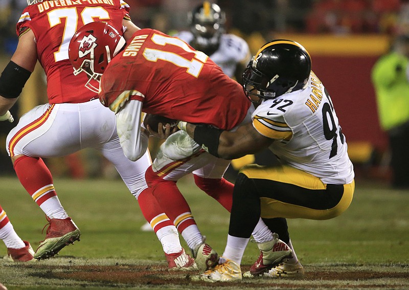 FILE - In this Jan. 15, 2017, file photo, Pittsburgh Steelers outside linebacker James Harrison sacks Kansas City Chiefs quarterback Alex Smith (11) during the second half of an NFL divisional playoff football game, in Kansas City, Mo.  The unbeaten Chiefs are eying some revenge when the Steelers roll into town Sunday. It was Pittsburgh that knocked the AFC West champs out of the playoffs last season. (AP Photo/Orlin Wagner)