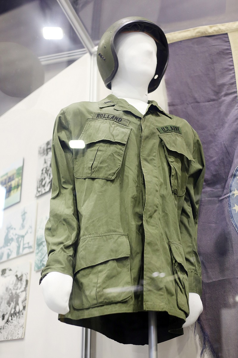 A jungle jacket worn by Antonio Holland, a Vietnam War veteran and former history professor at Lincoln University, is on display Wednesday in the Museum of Missouri Military History in Jefferson City.