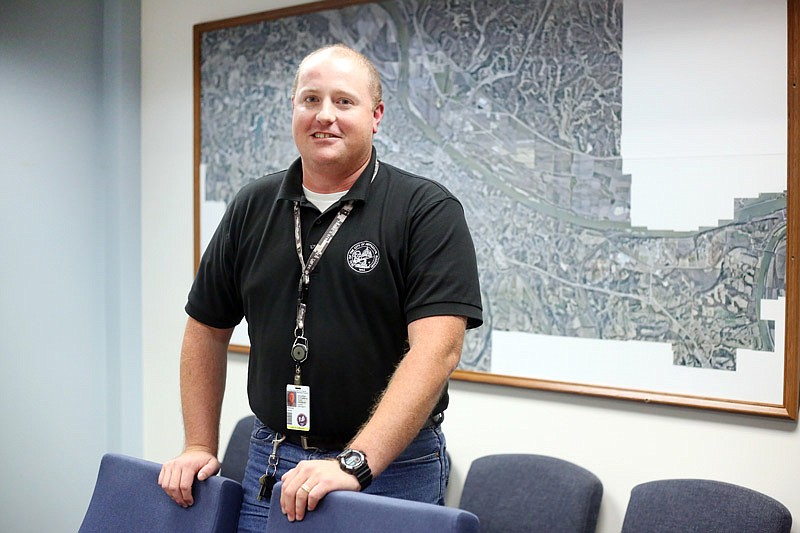 David Helmick poses for a picture in the John G. Christy Municipal Building. He is Jefferson City's housing property inspector.