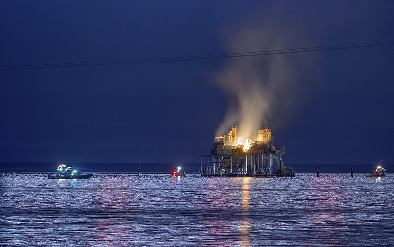 <p>AP</p><p>Jefferson Parish, Louisiana, authorities and others from other parishes respond to an oil rig explosion Sunday in Lake Pontchartrain.</p>