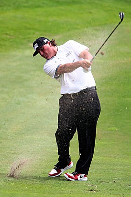 Pat Perez plays a shot during the 17th hole of Sunday's final round of the CIMB Classic in Kuala Lumpur, Malaysia.
