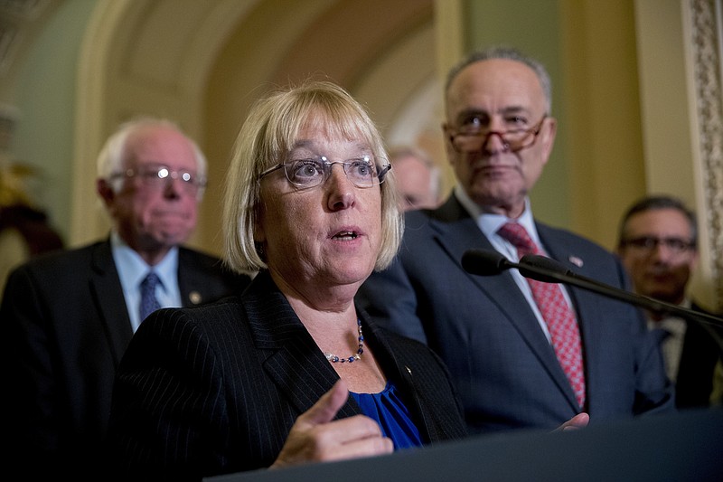 Sen. Patty Murray, D-Wash., accompanied by Sen. Bernie Sanders, I-Vt., left, and Senate Minority Leader Sen. Chuck Schumer of N.Y., right, speaks to reporters on Capitol Hill in Washington, Tuesday, Oct. 17, 2017, after she and Sen. Lamar Alexander, R-Tenn., say they have the "basic outlines" of a bipartisan deal to resume payments to health insurers that President Donald Trump has blocked. (AP Photo/Andrew Harnik)