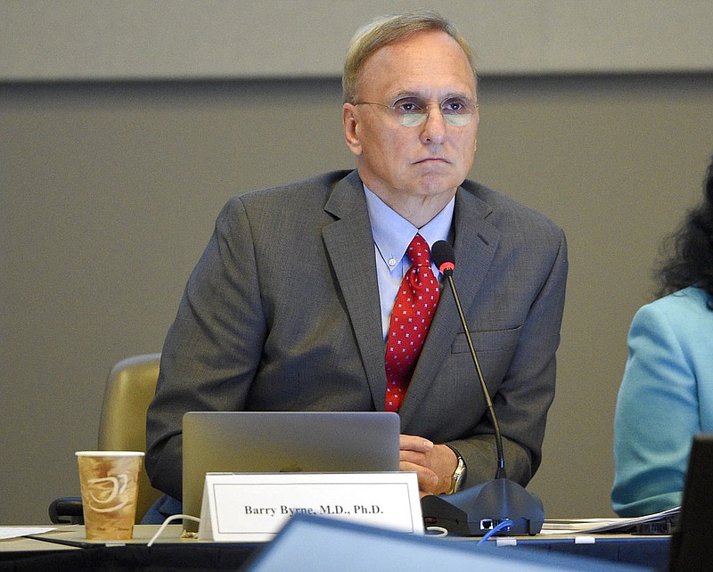 Dr. Barry Byrne listens to testimony concerning the approval of a potentially breakthrough drug for a form of blindness during a meeting of the The Cellular, Tissue and Gene Therapies advisory committee, Thursday, Oct. 12. 2017, at the FDA in Silver Spring, Md. 