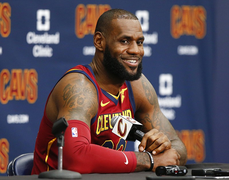 This Sept. 25, 2017 file photo shows Cleveland Cavaliers' LeBron James answering questions during the NBA basketball team media day in Independence, Ohio.
