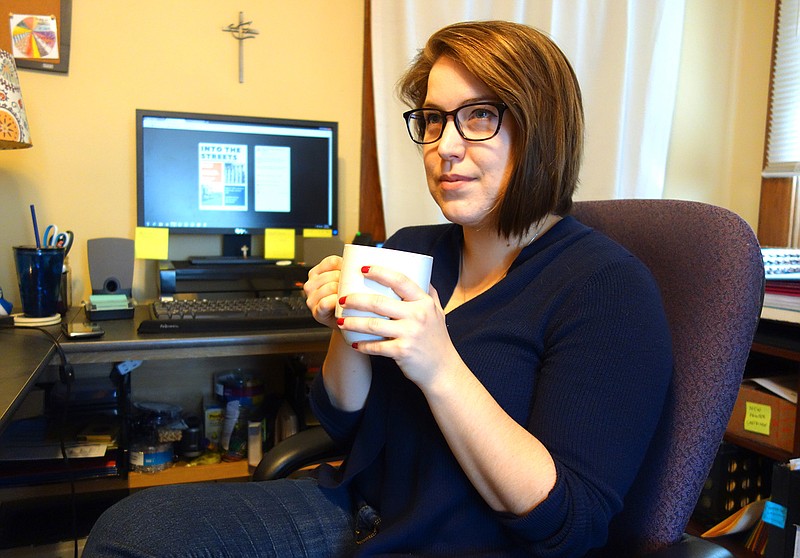 Kiva Nice-Webb, chaplain resident at Westminster College, sips a cup of joe in her office in the Center for Faith and Service. As a former barista, Nice-Webb knows her coffee.
