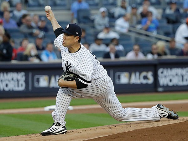 Yankees starting pitcher Masahiro Tanaka throws during the first inning of Game 5 of the AL Championship Series against the Astros on Wednesday in New York.