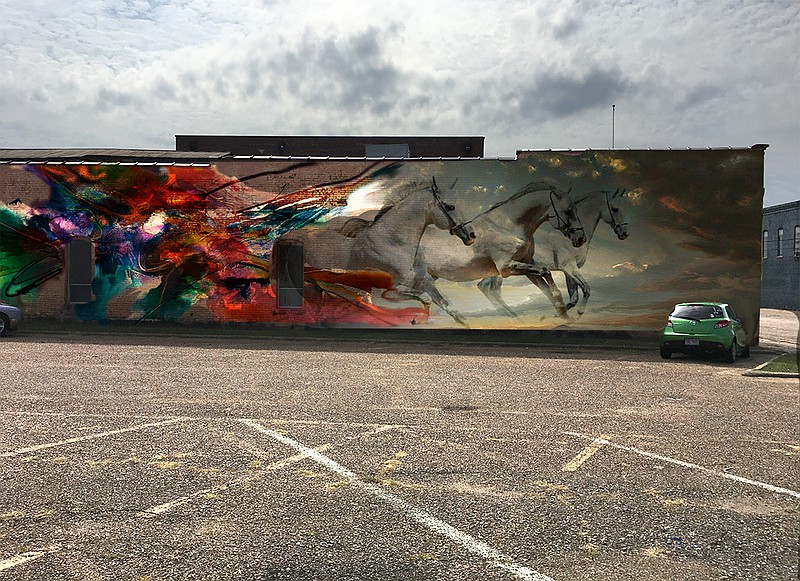 Two murals approved for downtown Texarkana include one by local artist Joel Wright, shown, that depicts running horses using lush, vibrant colors. It will be on the north-facing wall of a building behind Zapata's, opposite Hopkins Icehouse. 