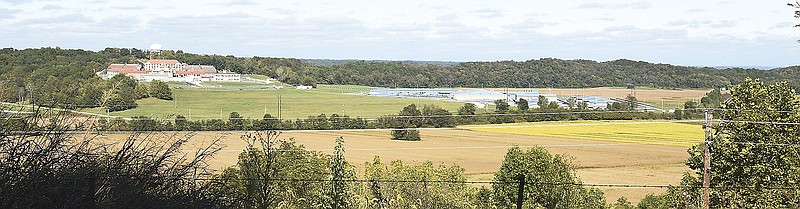 This is an overview of the fields, located in the bottom land adjacent to No More Victims Road and Algoa Road, running parallel to Union Pacific Railroad tracks. In the background left is Algoa Reformatory and in the background right is Jefferson City Correctional Center. The Jefferson City Board of Adjustment approved a conditional use permit for a topsoil supply business and extraction operation. Property owner Sandra Smith filed the application on behalf of Premium Topsoil LLC.