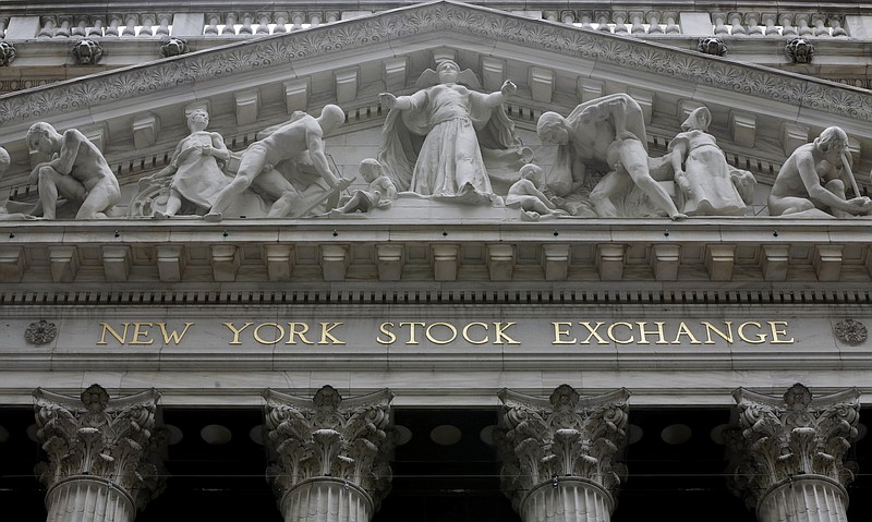 FILE - This Thursday, Oct. 2, 2014, file photo, shows the facade of the New York Stock Exchange. U.S. stocks were up slightly in early trading Friday, Oct. 20, 2017, as investors cheered a crop of strong company earnings. (AP Photo/Richard Drew, File)