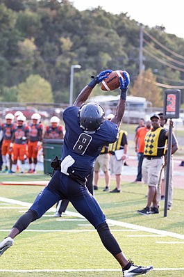 Lincoln wide receiver Blake Tibbs pulls down a touchdown pass during a game against Lincoln (Pa.) earlier this season at Dwight T. Reed Stadium