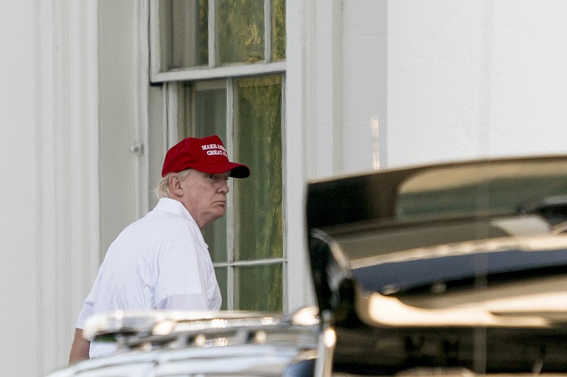 President Donald Trump arrives to the North Lawn of White House in Washington, Sunday, Oct. 22, 2017, after playing golf at Trump National Golf Club in Sterling, Va. (AP Photo/Andrew Harnik)