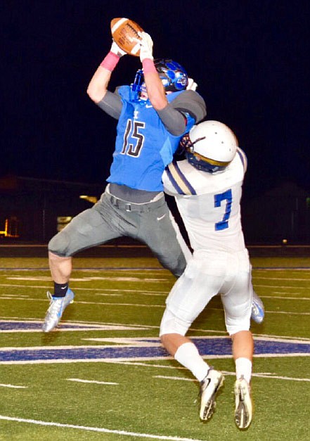 South Callaway junior tailback Peyton Leeper makes a leaping catch against Principia senior cornerback Jack Adler during the Bulldogs' 62-14 rout of the Panthers in a Class 2, District 5 first-round game Friday night, Oct. 20, 2017 in Mokane.