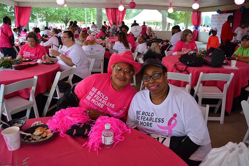 Rowenia Cheatham and Yolanda Nolen enjoy the Survivors Breakfast  before the beginning of Saturday's Race for the Cure.
