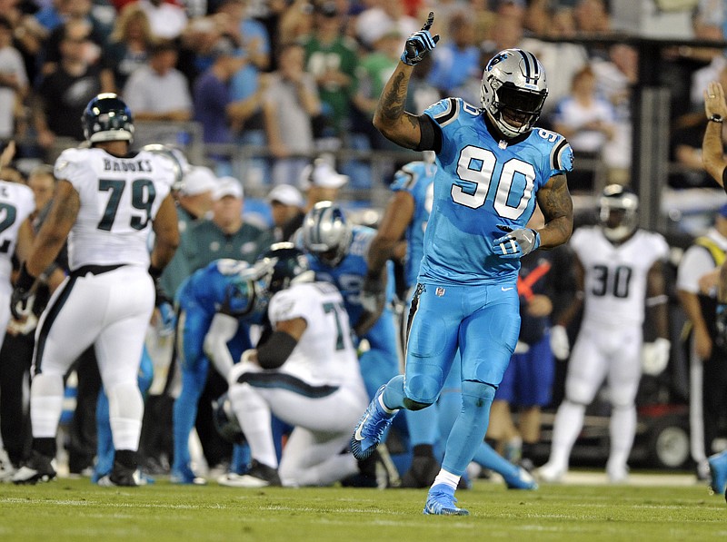 Carolina Panthers' Julius Peppers (90) celebrates his sack of Philadelphia Eagles' Carson Wentz in the first half of an NFL football game Oct. 12 in Charlotte, N.C. Veteran DE Julius Peppers has six and a half sacks in six games since his return to Carolina.