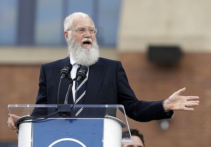 FILE - In this Saturday, Oct. 7, 2017, file photo, David Letterman speaks during the unveiling of a Peyton Manning statue outside of Lucas Oil Stadium, in Indianapolis. Letterman is being honored with the Mark Twain Prize for American Humor. He’ll receive the lifetime achievement award Sunday, Oct. 22, 2017, at Washington’s Kennedy Center. (AP Photo/Darron Cummings, File)