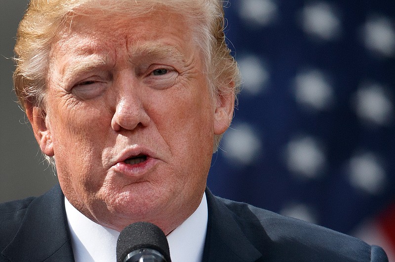 President Donald Trump speaks during a joint statement with Singapore's Prime Minister Lee Hsien Loong in the Rose Garden of the White House, Monday, Oct. 23, 2017, in Washington. (AP Photo/Evan Vucci)