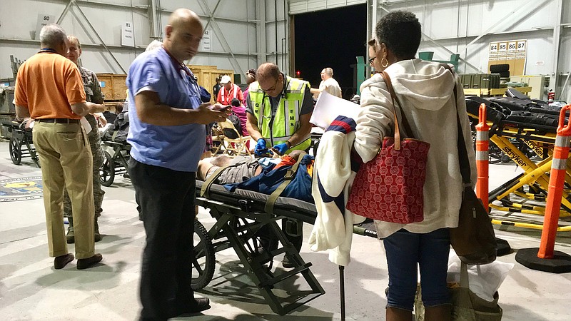 Following Hurricane Maria, evacuated dialysis patients are given medical care and shelter