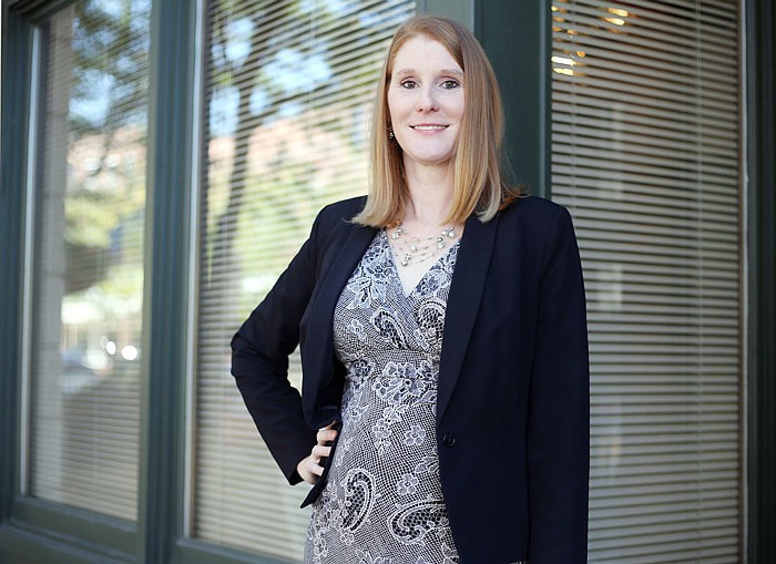 Heather McCreery poses for a portrait outside of her office at Turnbull & Stark PC in Jefferson City.