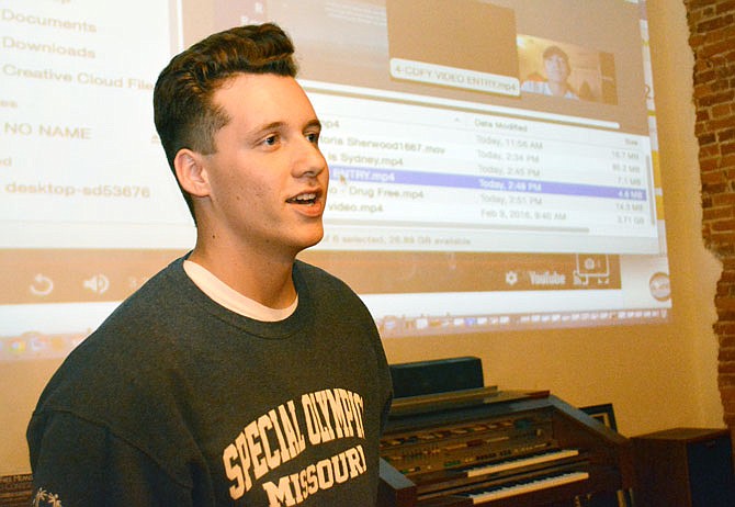 Sawyer Bonnahan speaks to a crowd Monday about the video he created encouraging young people to stay drug free. 