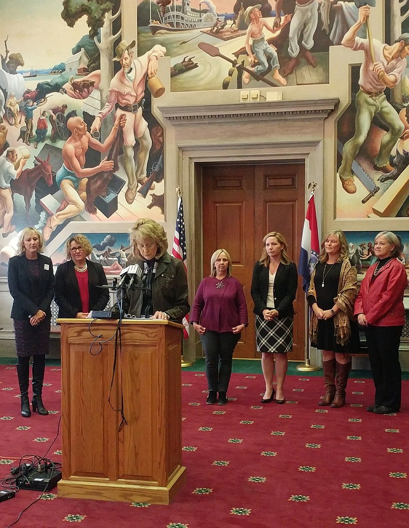 <p>Rep. Kathryn Swan, R-Cape Girardeau, announces in the State Capitol’s House Lounge Tuesday the recommendations of the state’s legislative task force on dyslexia that Swan is the chairperson of; others members of the task force stand behind her.</p>