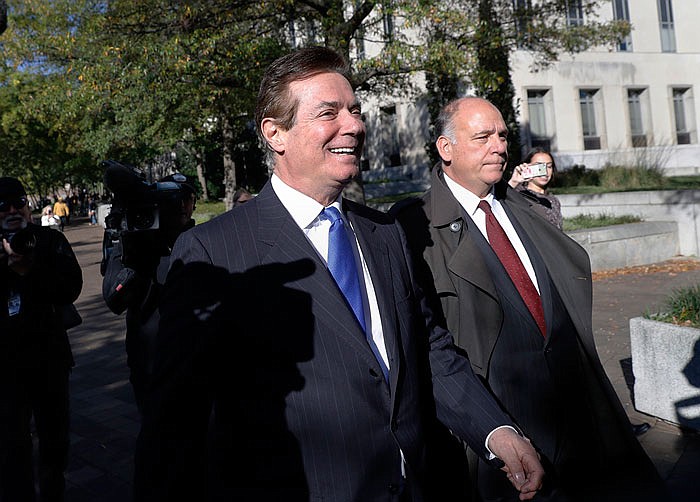 Paul Manafort leaves Federal District Court in Washington. Manafort, President Donald Trump's former campaign chairman, and Manafort's business associate Rick Gates have pleaded not guilty to felony charges of conspiracy against the United States and other counts.